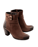 A pair of tan leather ankle boots